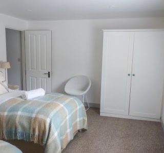 Franks Bedroom 2, Set up with twin single beds. Wardrobe pictured central right.